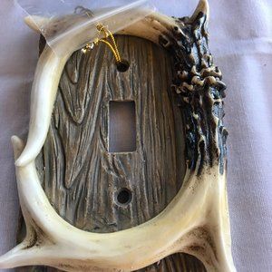 antler electrical switch plate, single switch.  nwt   4 1/2 x 3 inches